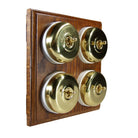 Switch to Wood's Dolly Light Switch Smooth Dome - 4 Gang Horizontal Polished Brass in Medium Oak 