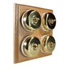 Switch to Wood's Dolly Light Switch Smooth Dome - 4 Gang Horizontal Polished Brass in Unfinished Oak
