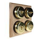 Switch to Wood's Dolly Light Switch Smooth Dome - 4 Gang Horizontal Polished Brass in Unfinished Oak