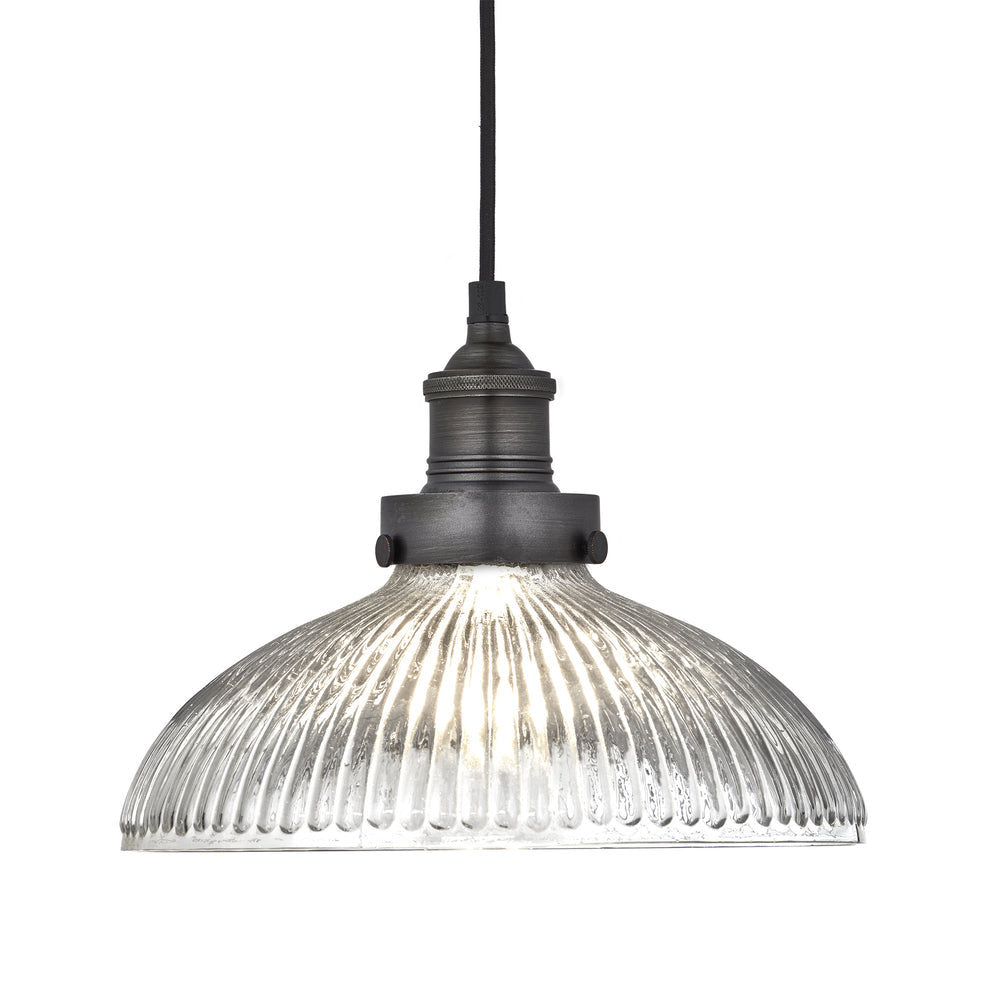 Industrial-style pendant light with a glass dome with a pewter holder.